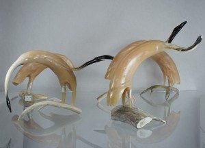 A bunch of muskox carvings in a row